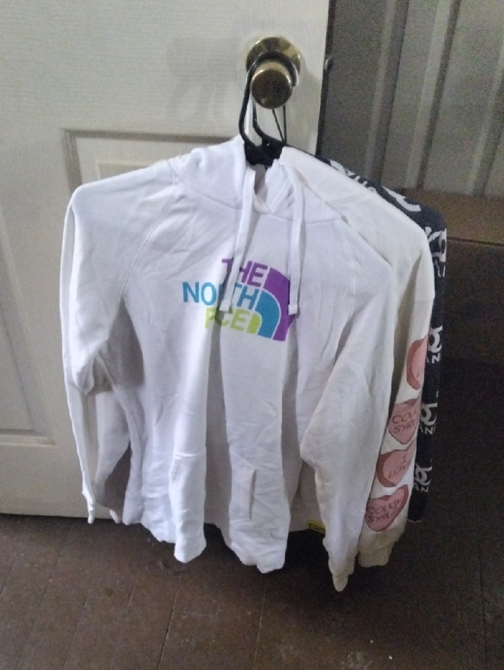 The North Face White Pullover Hoodie with Multicolor Logo
